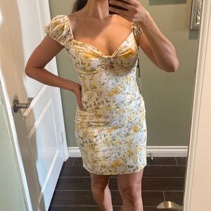 Spring/summer dress with cap sleeves. Brand new with tags never worn.